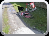 Entrance with hole made by dustcart